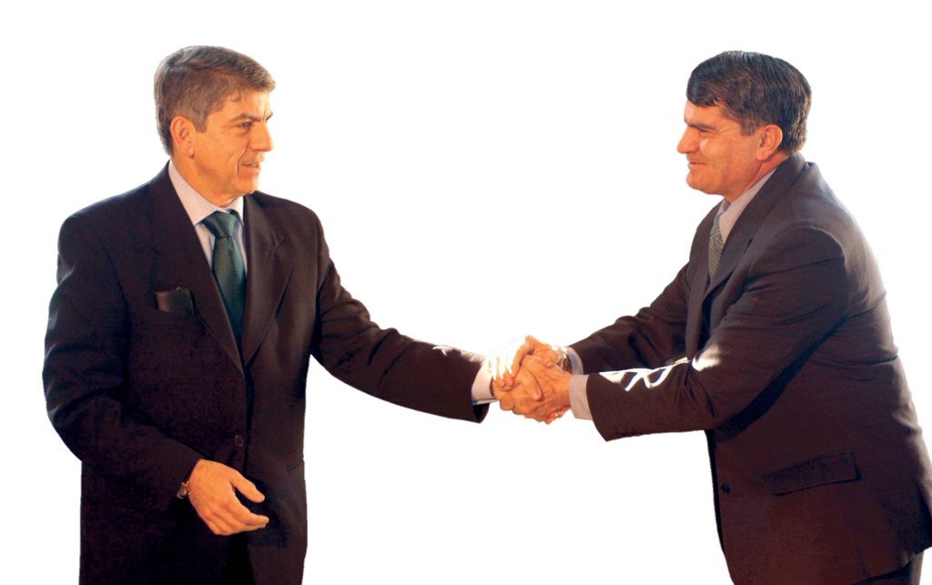 businessmen-shaking-hands-1240995-1024x643