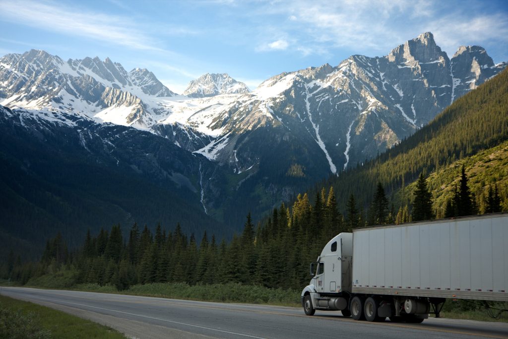 logistics-lorry-mountains-93398-1024x683