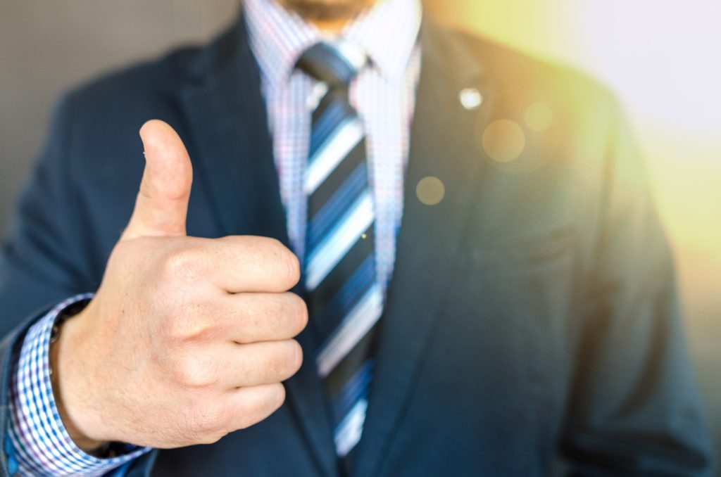 close-up-photo-of-man-wearing-black-suit-jacket-doing-thumbs-684385-1024x678