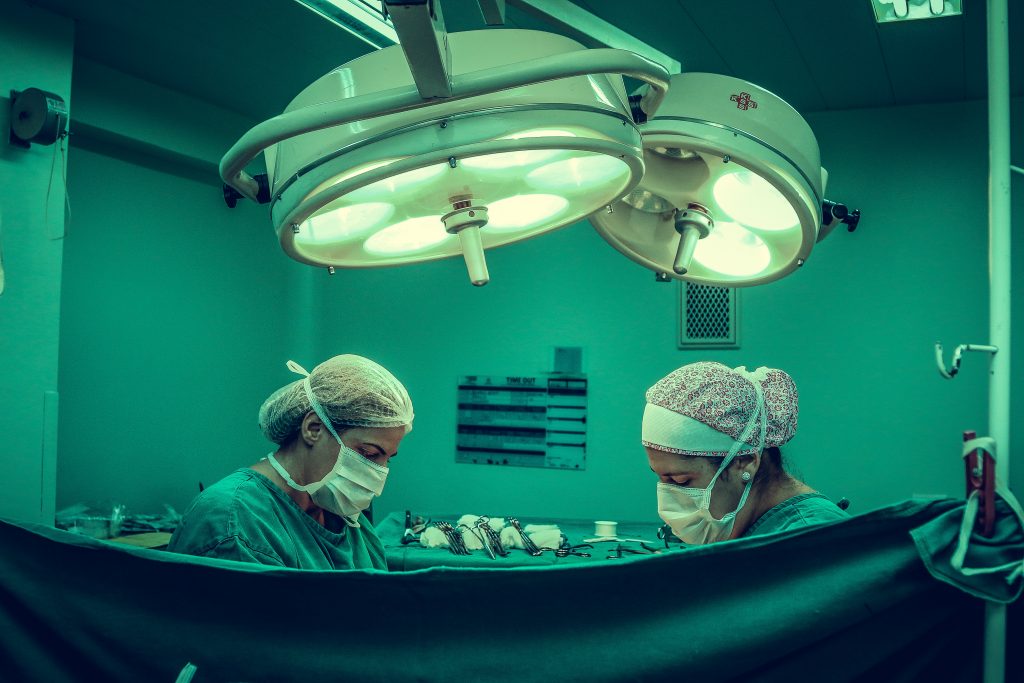 two-person-doing-surgery-inside-room-1250655-1024x683