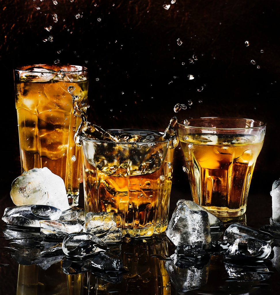 alcohol-bar-black-background-close-up-602750-972x1024