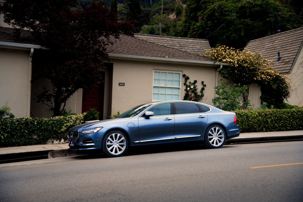 photo-of-blue-sedan-parked-on-the-side-of-the-road-1213293-1024x683