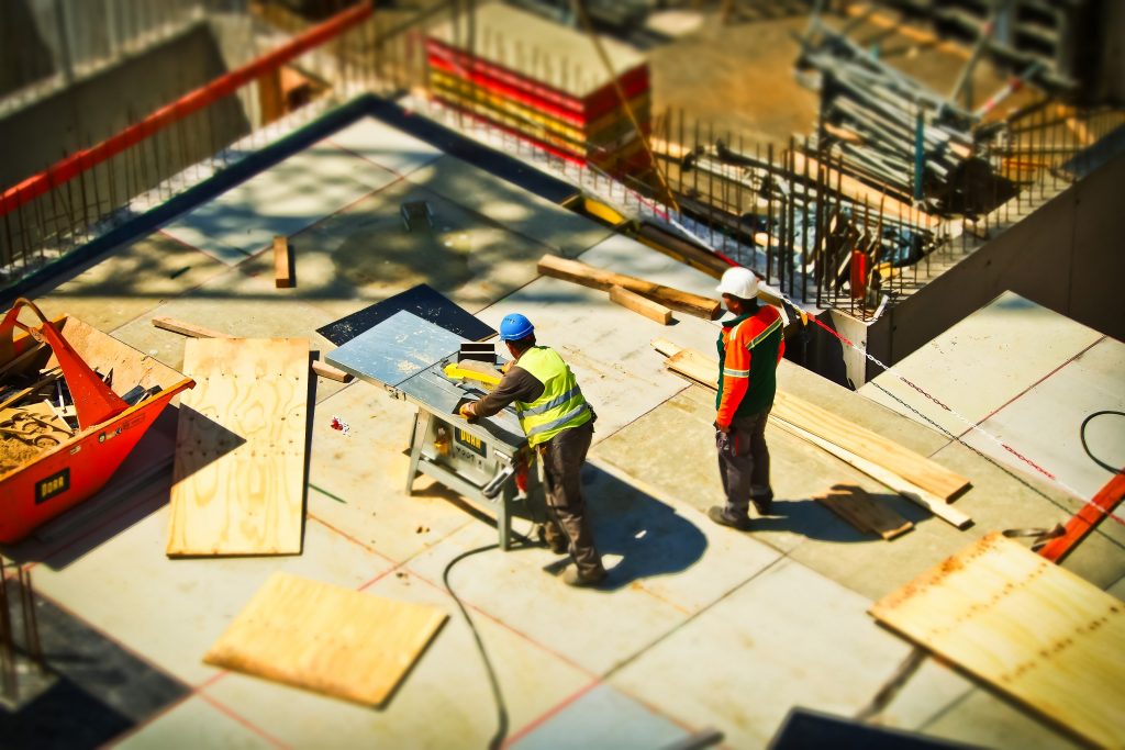 2-man-on-construction-site-during-daytime-159306-1-1024x683