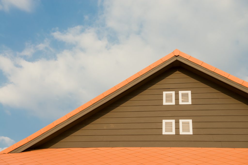 orange-and-gray-painted-roof-under-cloudy-347152-1024x684